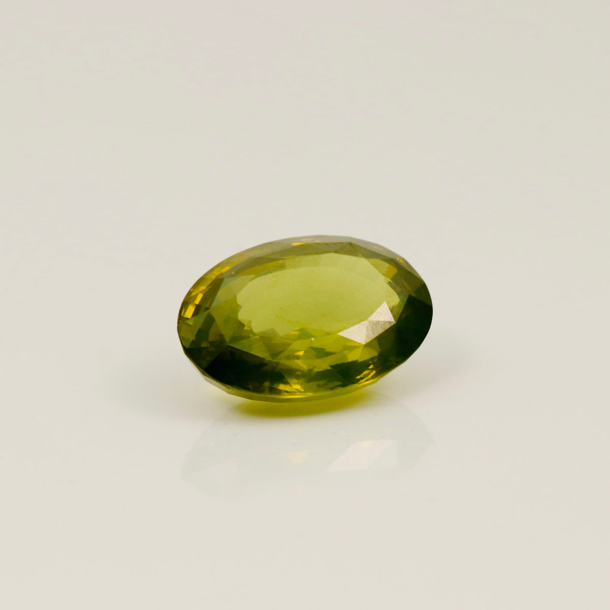Natural Green Zircon – 15.60 ct Oval Faceted Gemstone
