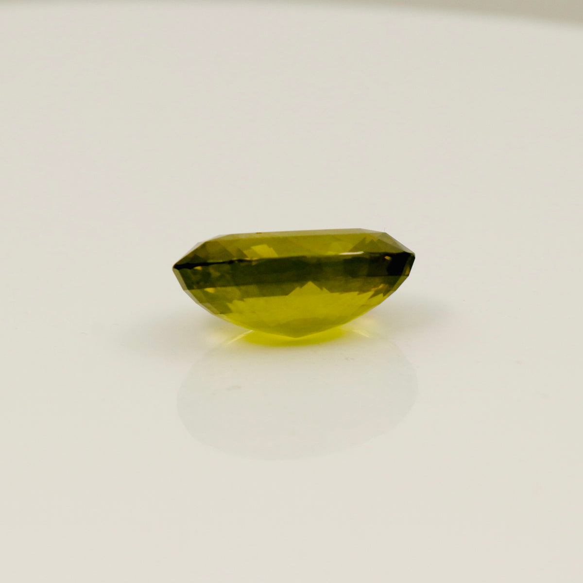 Natural Green Zircon – 15.60 ct Oval Faceted Gemstone