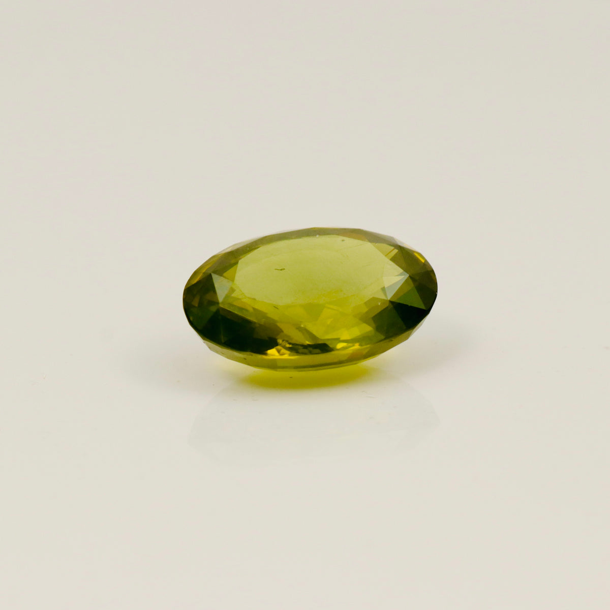 Natural Green Zircon – 15.60 ct Oval Faceted Gemstone
