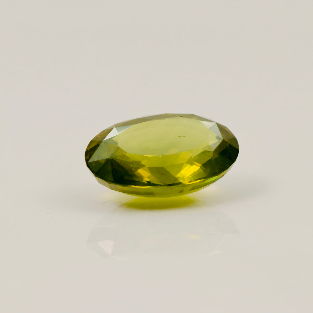 Natural Green Zircon – 15.60 ct Oval Faceted Gemstone