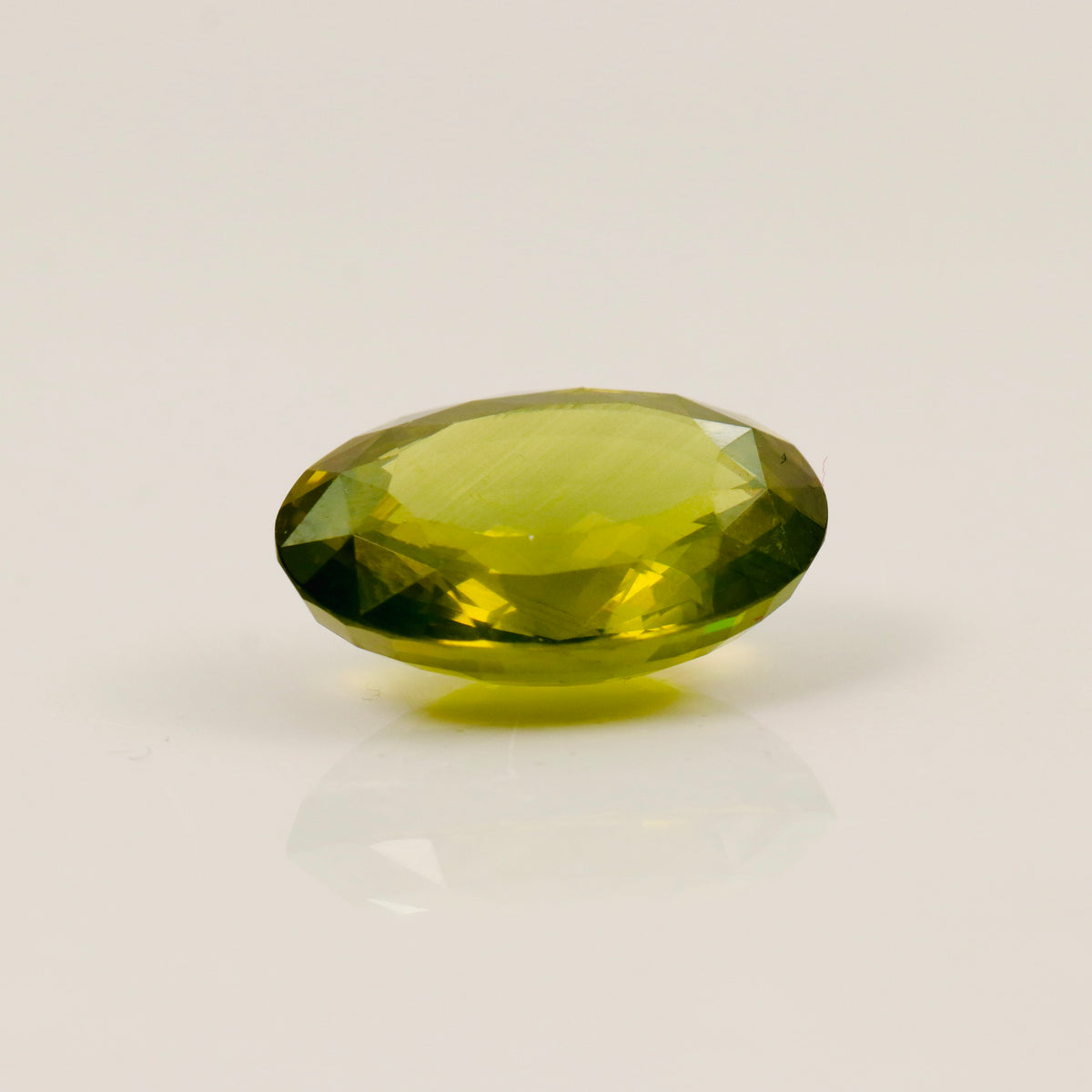 Natural Green Zircon – 15.60 ct Oval Faceted Gemstone