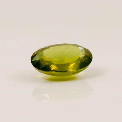 Natural Green Zircon – 15.60 ct Oval Faceted Gemstone