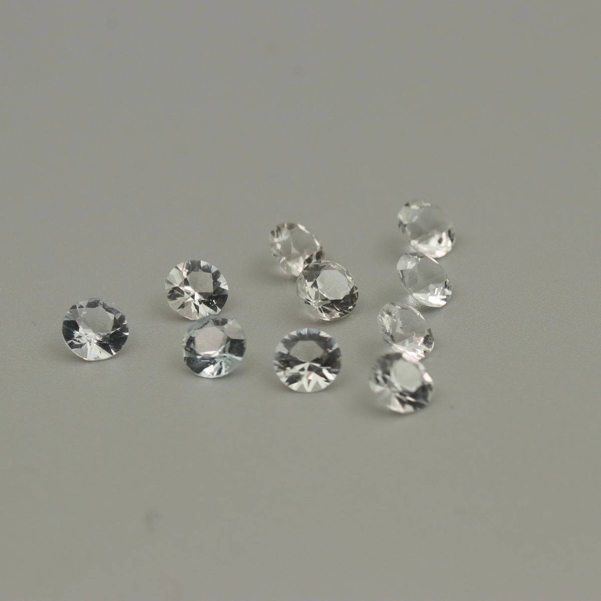 Natural White Topaz – 10 Calibrated Round Gemstones – 5.35 ct Total – 5 mm