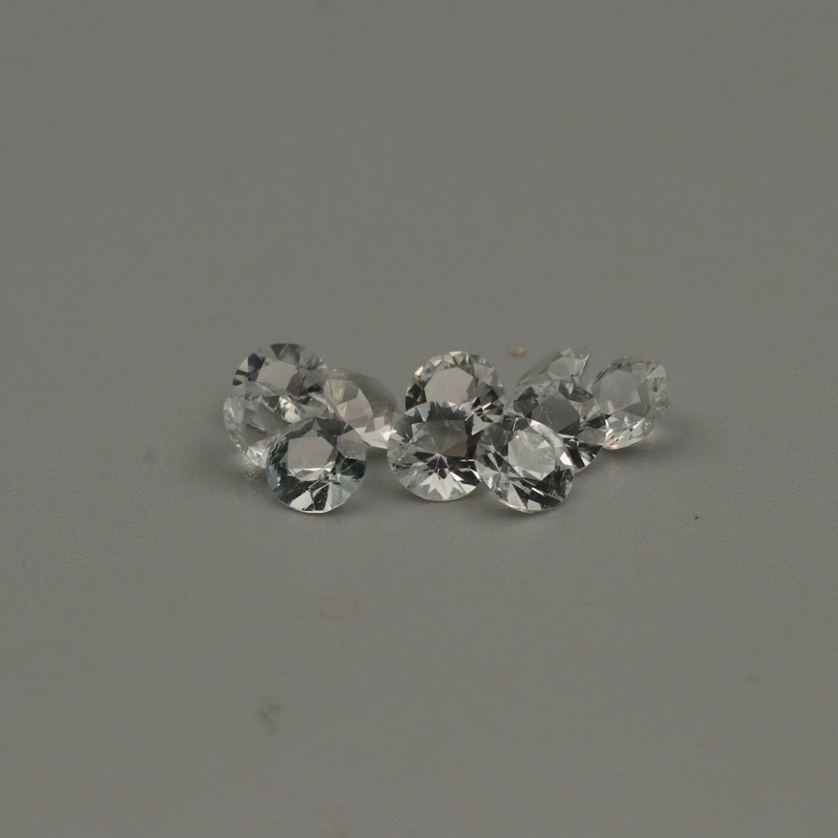 Natural White Topaz – 10 Calibrated Round Gemstones – 5.35 ct Total – 5 mm