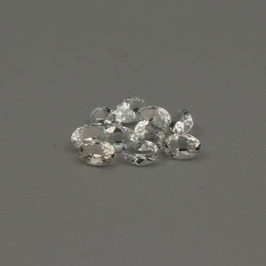 Natural White Topaz – 10 Calibrated Oval Gemstones – 4.70 ct Total – 6 × 4 mm